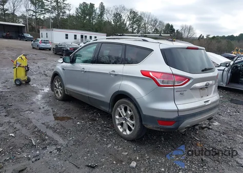 2016 Ford Escape Titanium z USA, uszkodzony, nr VIN 1FMCU0J96GUC19106
